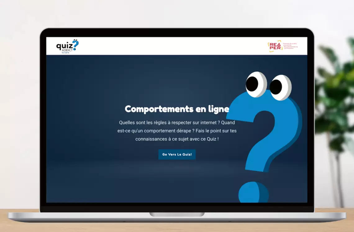 Un ordinateur portable avec sur l'écrans une page de la plateforme Quizaddict