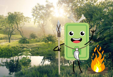 Paysage avec une mascotte en forme de smartphone devant un feu en premier plan